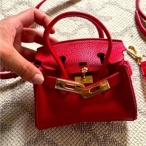 Mini bag with adjustable strap.